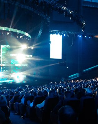 A lot of people in a big hall